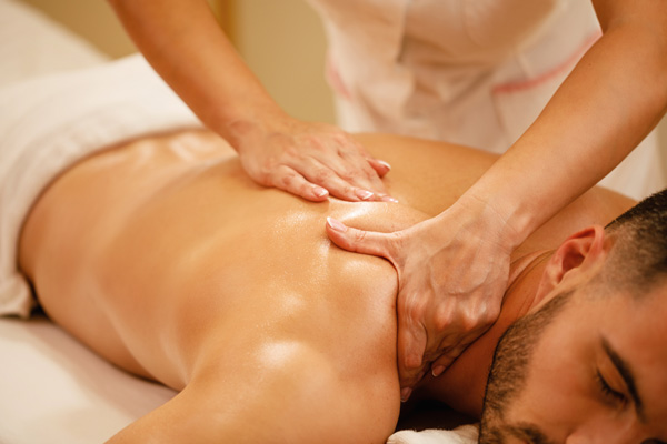 man receiving shoulder massage