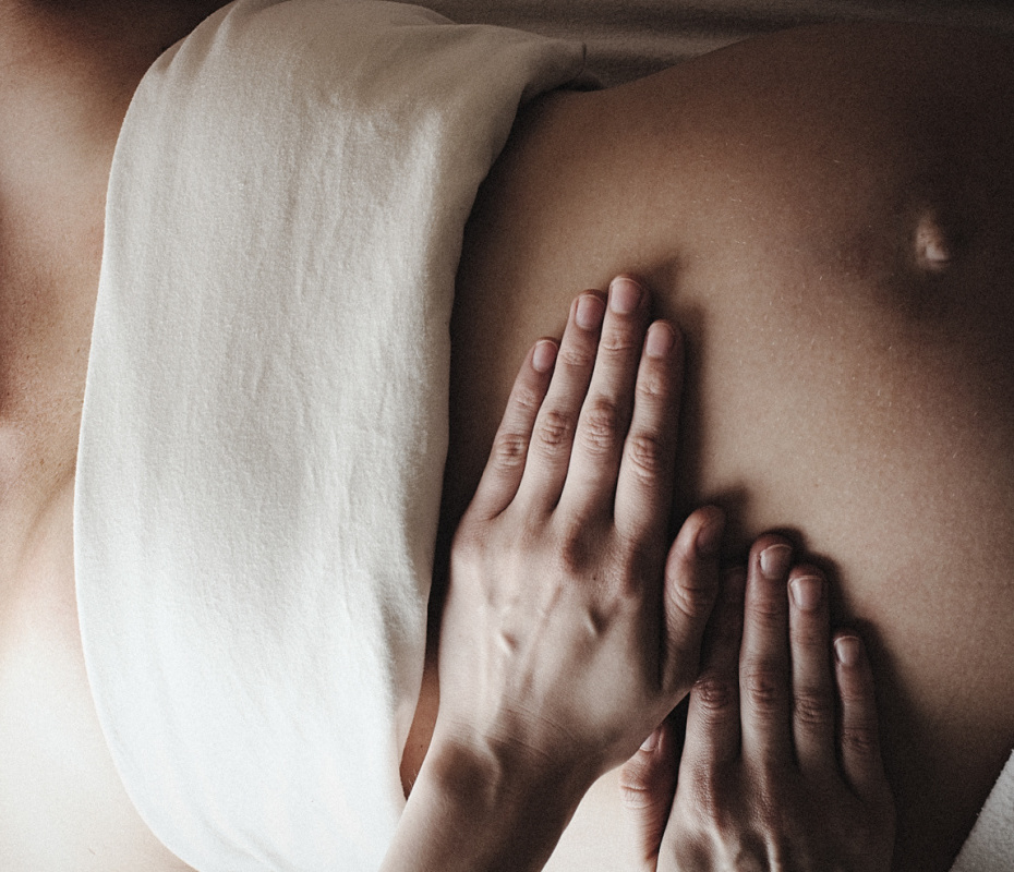 woman receiving pregnancy massage